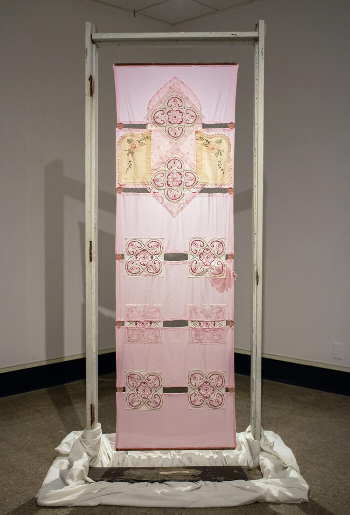 Tapestry #2, 2022, textile assemblage, doorjamb, threshold 36" x 84"